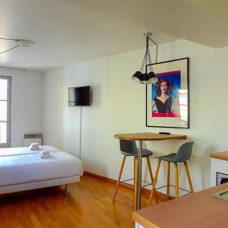 Appartamento Charmant Studio Dans Un Immeuble Paris 5 Esterno foto