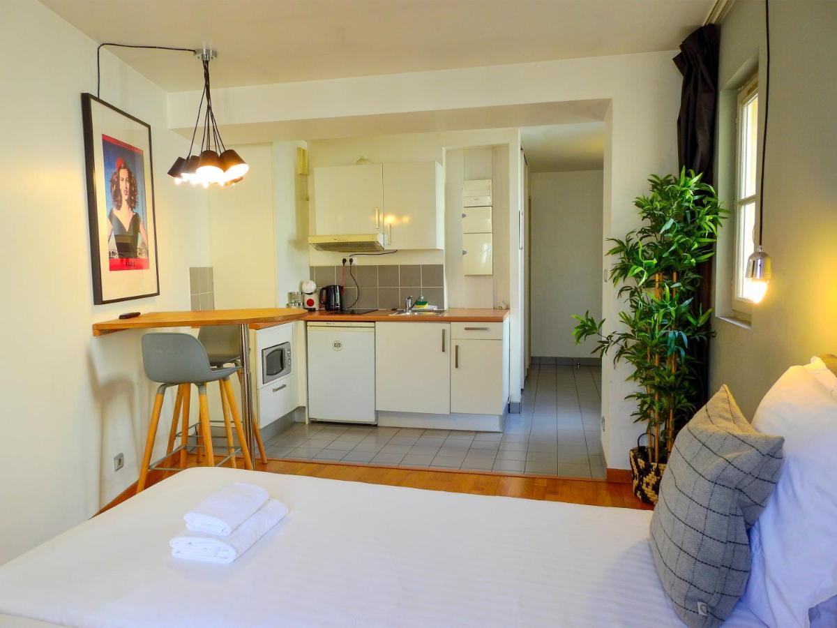 Appartamento Charmant Studio Dans Un Immeuble Paris 5 Esterno foto