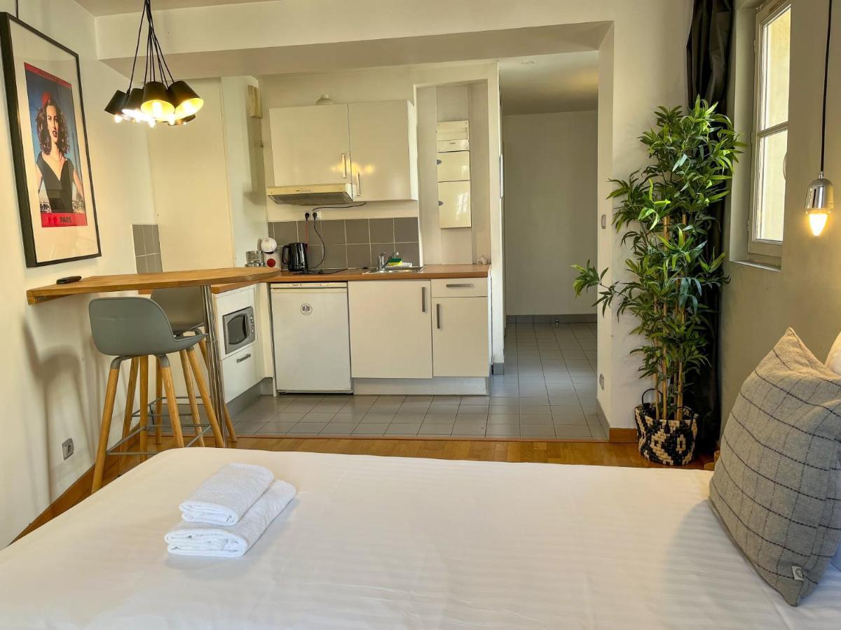 Appartamento Charmant Studio Dans Un Immeuble Paris 5 Esterno foto